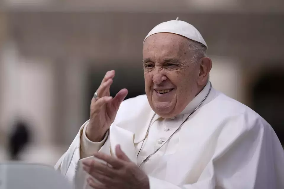 FILE - Pope Francis waves as he leaves after his weekly general audience in St. Peter s Square at The Vatican, Wednesday, April 10, 2024. (AP Photo/Andrew Medichini, File)