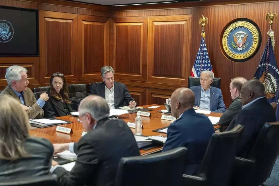In this image provided by the White House, President Joe Biden, along with members of his national security team, receive an update on an ongoing airborne attack on Israel from Iran, as they meet in the Situation Room of the White House in Washington, Saturday, April 13, 2024. (Adam Schultz/The White House via AP)