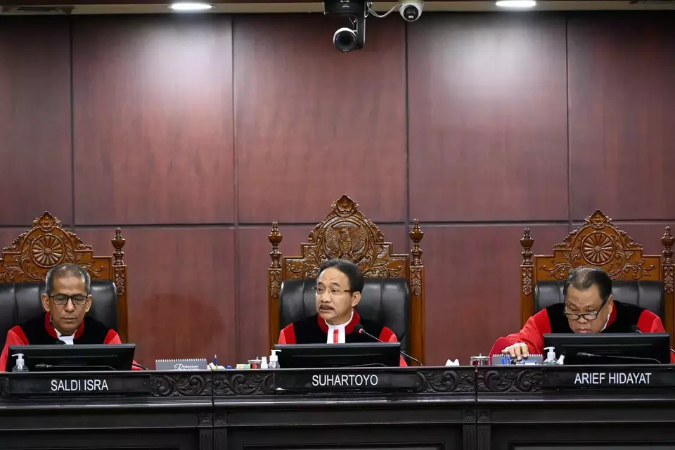 Constitutional Court Chief Justice Suhartoyo, center, presides over the verdict hearing of the presidential election dispute at the courthouse in Jakarta, Monday, April 22, 2024. (Antara Photo/M Risyal Hidayat)