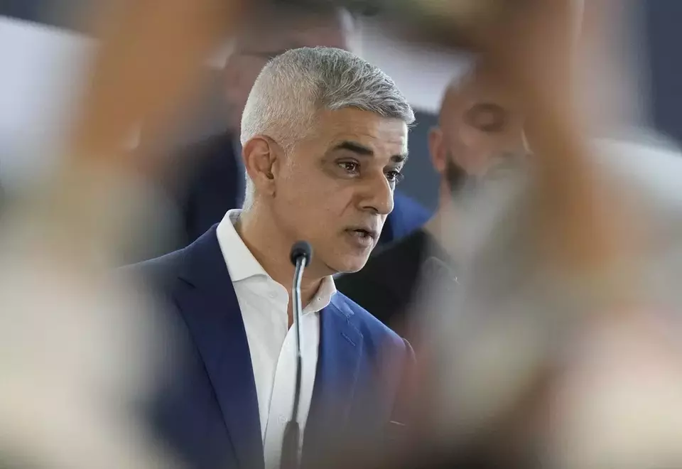Sadiq Khan makes a speech after he is re-elected for a record third time as Mayor of London, following the counting of votes, at City Hall in London, Saturday, May 4, 2024. (AP Photo/Alastair Grant)