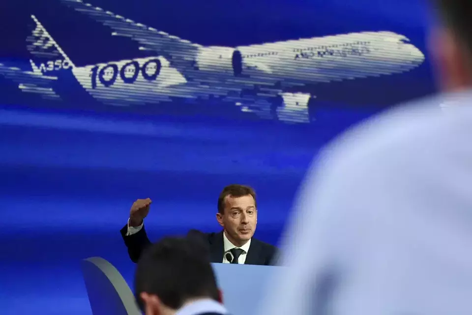 FILE - Airbus CEO Guillaume Faury presents the European aerospace giant full year results, Feb. 15, 2024 in Blagnac, near Toulouse, southwestern France. In the latest round of their decades-long battle for dominance in commercial aircraft, Europe