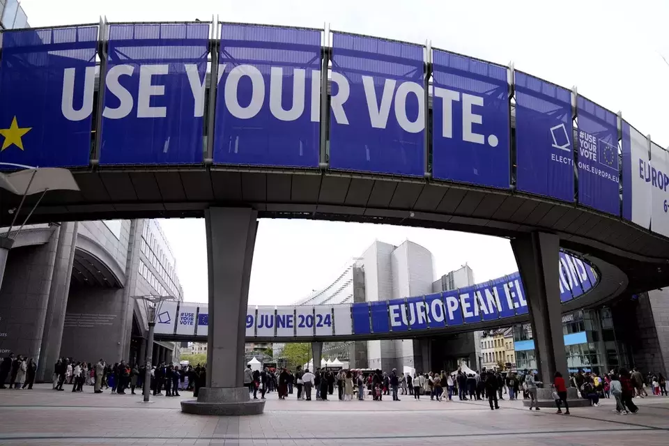 FILE - People wait in line to visit the European Parliament during Europe Day celebrations in Brussels on May 4, 2024. (AP Photo/Virginia Mayo, File)