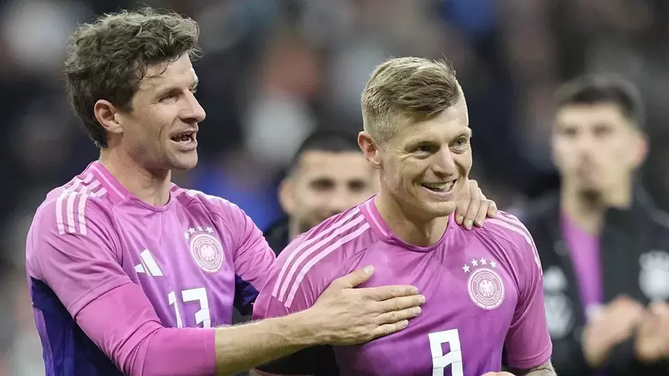 German footballer Thomas Muller (left). (AP Photo/Martin Meissner)