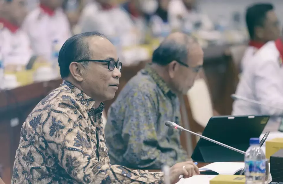 Communication and Informatics Minister Budi Arie Setiadi, left, and National Cyber and Crypto Agency (BSSN) Head Hinsa Siburian attend a hearing with the House of Representatives Commission I on security affairs at the parliament building in Jakarta, Thursday, June 27, 2024. (B-Universe Photo/Joanito De Saojoao)
