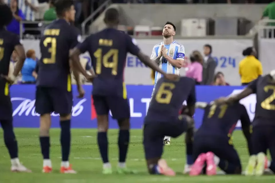 Lionel Messi reacts during a penalty shootout against Ecuador at a Copa America quarterfinal soccer match in Houston, Thursday, July 4, 2024.(AP Photo/Kevin M. Cox)
