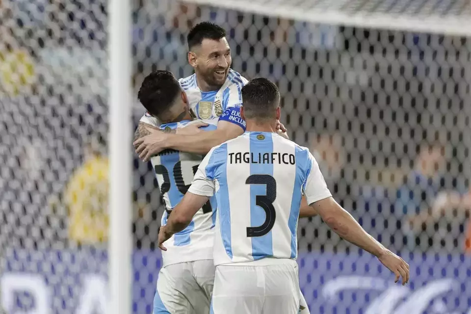 Lionel Messi is congratulated after scoring a goal for Argentina during a Copa America semifinal soccer match against Canada in East Rutherford, N.J., Tuesday, July 9, 2024. (AP Photo/Adam Hunger)