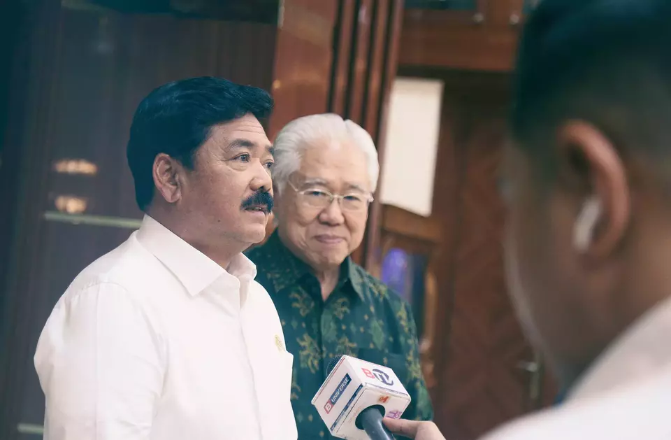 Chief Security Minister Hadi Tjahjanto, left, speaks to BTV news channel at his office in Jakarta accompanied by B-Universe Media Holdings Executive Chairman Enggartiasto Lukita, Thursday, July 11, 2024. (B-Universe Photo/Joanito De Saojoao)
