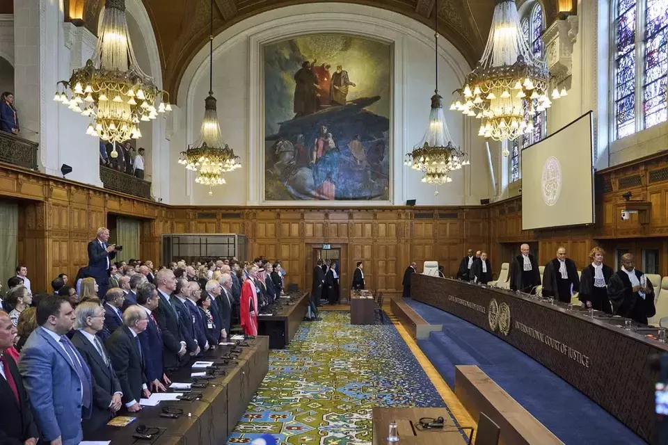 The Judges enter the International Court of Justice, or World Court, in The Hague, Netherlands, Friday July 19, 2024, where the United Nations top court is delivering a nonbinding advisory opinion Friday on the legality of Israel s 57-year occupation of lands sought for a Palestinian state, a ruling that could have more effect on international opinion than it will on Israeli policies. (AP Photo/Phil Nijhuis)