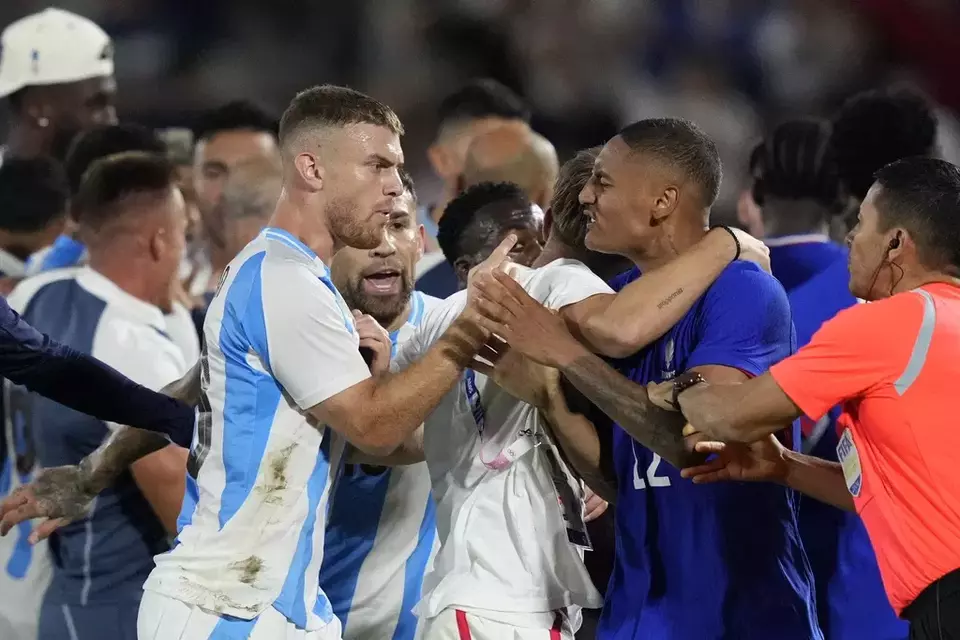 France and Argentina players argue at the end of a quarter-final soccer match between France and Argentina, at Bordeaux Stadium, during the 2024 Summer Olympics, Friday, Aug. 2, 2024, in Bordeaux, France. (AP Photo/Moises Castillo)