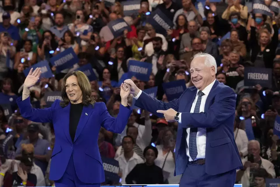 Democratic presidential nominee Vice President Kamala Harris and running mate Minnesota Governor Tim Walz appear at the Fiserv Forum during a campaign rally in Milwaukee, Tuesday, Aug. 20, 2024. (AP Photo/Jacquelyn Martin)