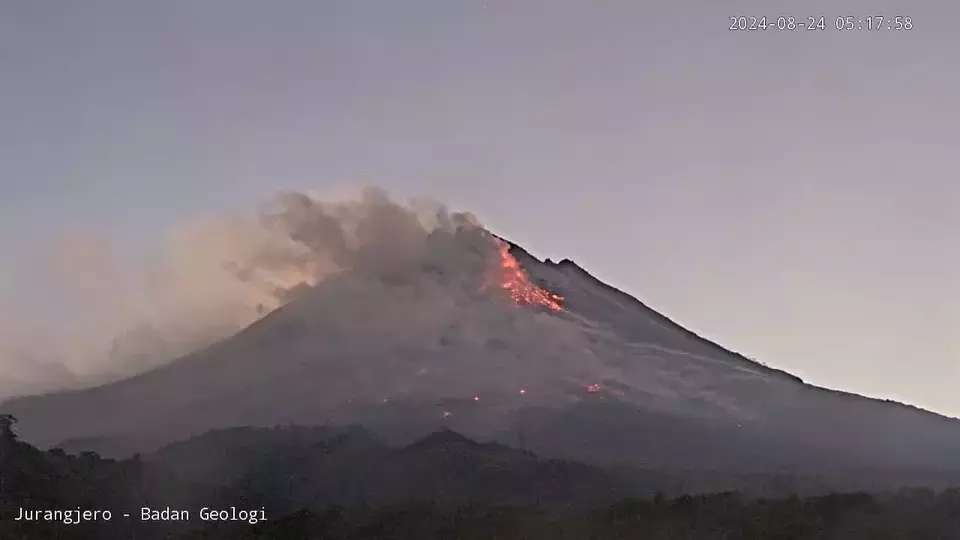 Mount Merapi, located on the border of Central Java and Yogyakarta, releases 18 pyroclastic flows early Saturday morning, Aug. 24, 2024. The pyroclastic flows began at 6:00 a.m. local time, leading authorities to maintain the volcano at Level 3 (Alert). (Beritasatu.com/Joko Laksono)