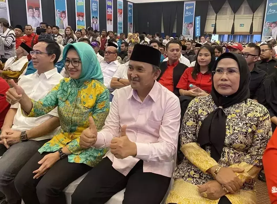 Airin Rachmi Diany, second left, attends a ceremony to declare her candidacy as the Banten gubernatorial candidate at the International Convention and Exhibition (ICE) center in Tangerang, Banten, Sunday, Aug. 25, 2024. (B-Universe Photo/Juan Ardya Guardiola)