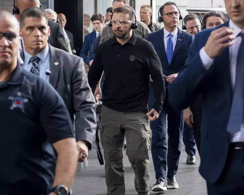 FILE - In this photo provided by the US Army, Ukrainian President Volodymyr Zelensky, center, tours the Scranton Army Ammunition Plant in Scranton, Pennsylvania, Sunday, Sept. 22, 2024. (Staff Sgt. Deonte Rowell/U.S. Army via AP)
