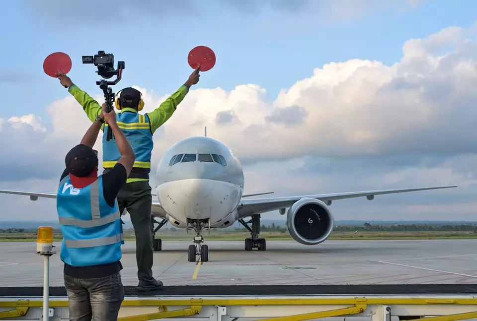 A Qatar Cargo plane carrying MotoGP logistics lands at the Lombok International Airport in West Nusa Tenggara, Tuesday, Sept. 24, 2024. (Antara Photo/Ahmad Subaidi)