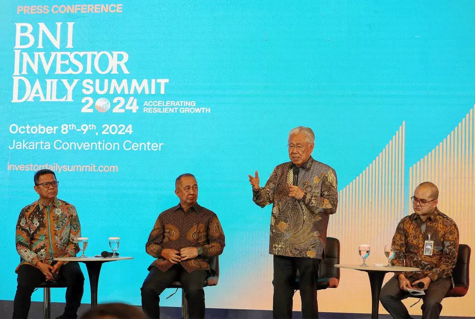 B-Universe Executive Chairman Enggartiasto Lukita, second right, speaks in a news conference accompanied by BNI Chief Executive Officer Royke Tumilaar, left, B-Universe CEO Rio Abdurrachman, second left, and BNI Digital Banking & Transaction Director Hussein Paolo Kartadjoemena, right, in Jakarta on Monday, Sept. 30, 2024. (B-Universe Photo/Joanito De Saojoao)