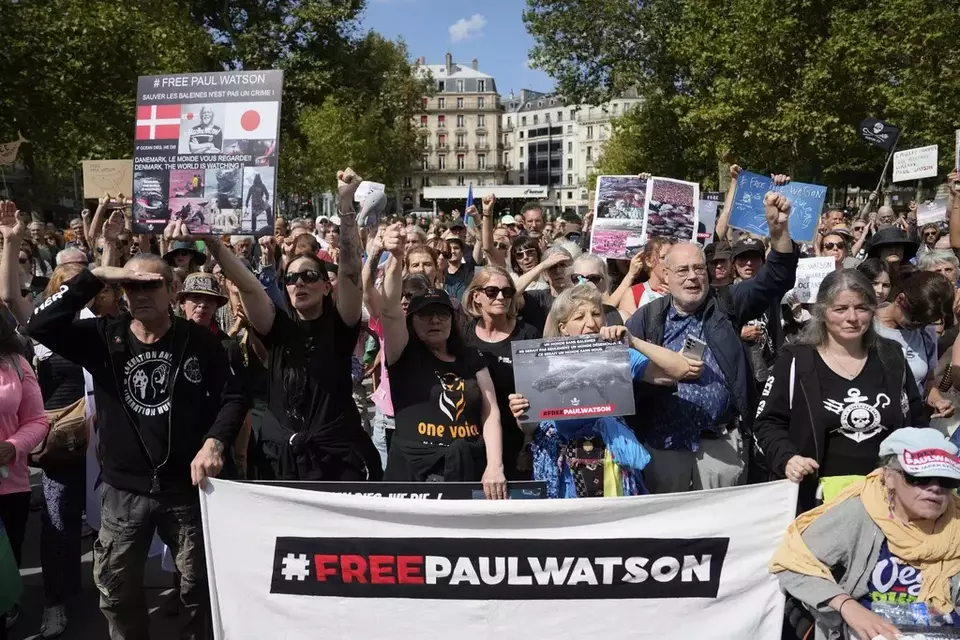 FILE- People gather in Paris, France, Wednesday, Sept. 4, 2024, to demand the release of activist Paul Watson who was arrested in Greenland in July and asked French President Emmanuel Macron for "political asylum". (AP Photo/Aurelien Morissard, File)