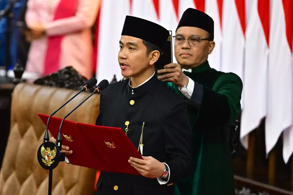 Gibran Rakabuming Raka is sworn in as vice president at the national legislature complex in Jakarta, Sunday, Oct. 20, 2024. (Antara Photo/Rivan Awal Lingga)