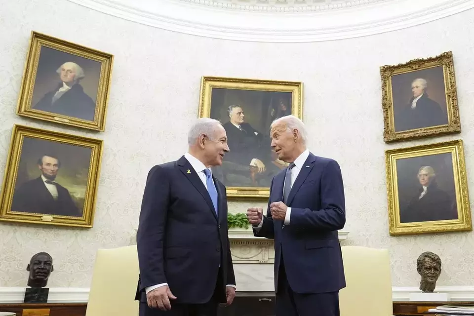 FILE - US President Joe Biden, right, talks with Israeli Prime Minister Benjamin Netanyahu, left, in the Oval Office of the White House in Washington, July 25, 2024. (AP Photo/Susan Walsh, File)