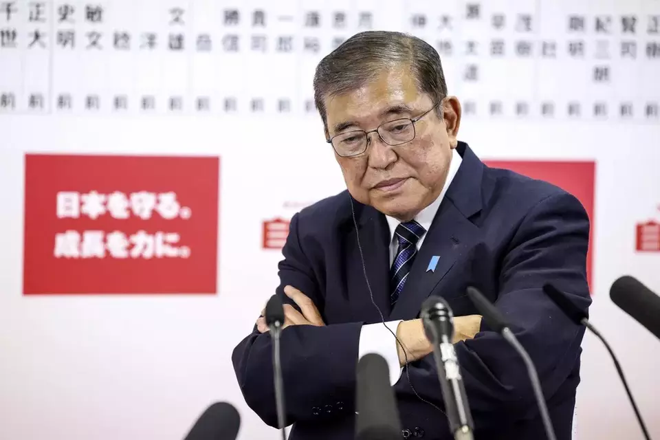 Japanese Prime Minister and president of the Liberal Democratic Party (LDP) Shigeru Ishiba speaks to the media regarding the early result of lower house election, at the LDP headquarters Sunday, Oct. 27, 2024 in Tokyo, (Takashi Aoyama/Pool Photo via AP)