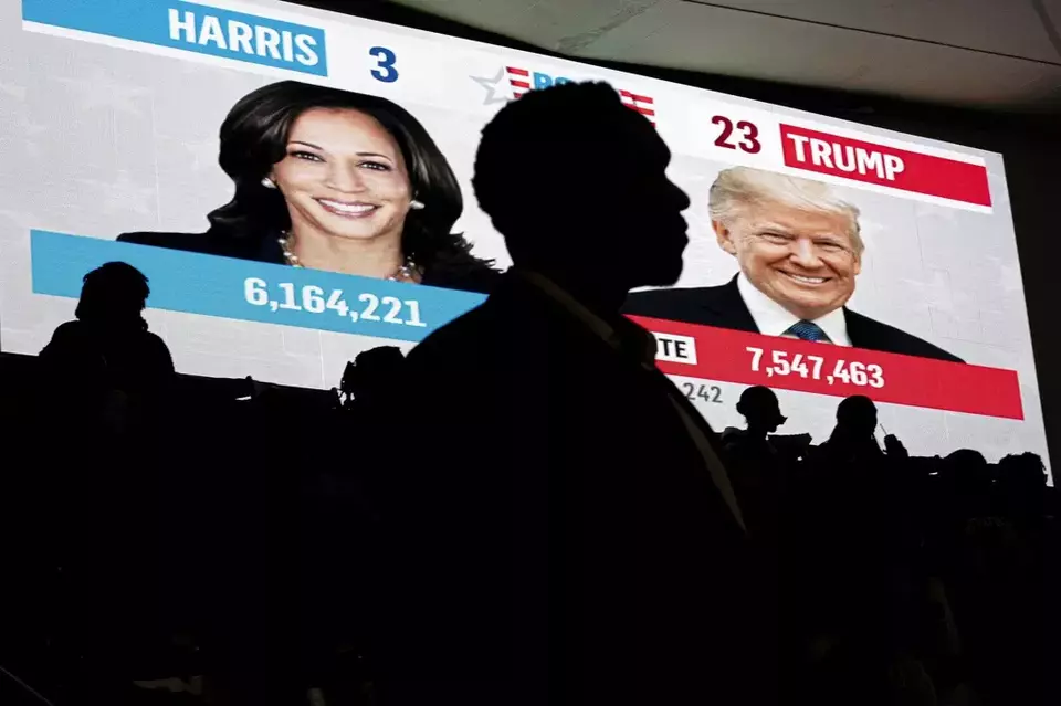 Howard University students watch live election results during a watch party near an election night event for Democratic presidential nominee Vice President Kamala Harris at Howard University in Washington, Tuesday, Nov. 5, 2024. (AP Photo/Nathan Howard)
