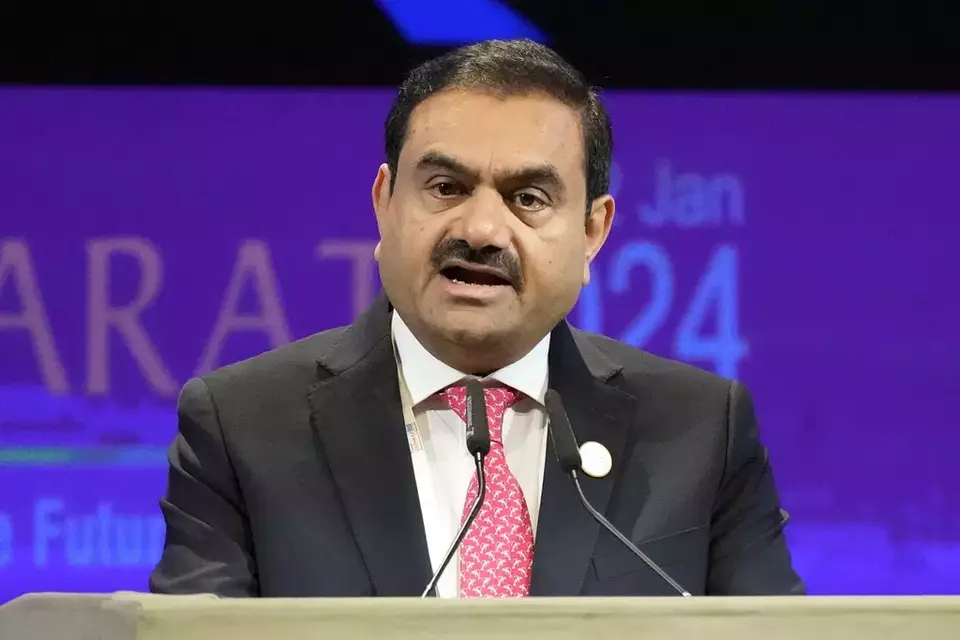 India's Adani Group Chairman Gautam Adani addresses the Vibrant Gujarat Global Summit in Gandhinagar, India, Jan.10, 2024. (AP Photo/Ajit Solanki)