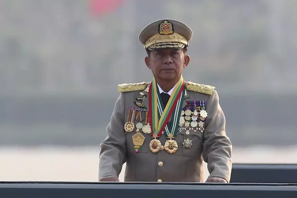 FILE - Senior Gen. Min Aung Hlaing, head of the military council, inspects officers during a parade to commemorate Myanmar