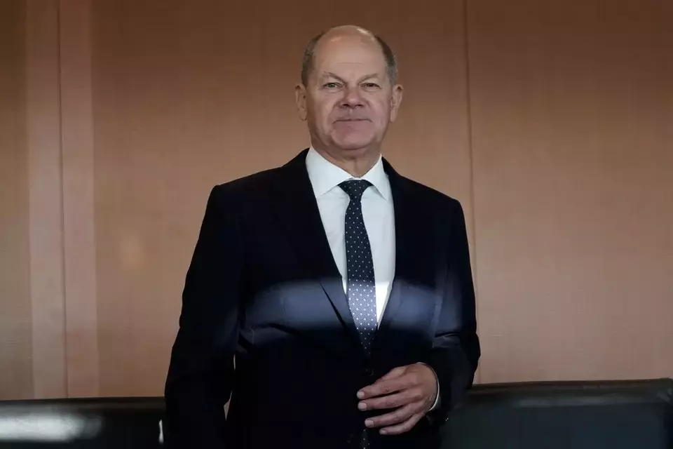 FILE - German Chancellor Olaf Scholz arrives for a German government cabinet meeting at the chancellery in Berlin, Germany, Nov. 27, 2024. (AP Photo/Markus Schreiber, File)