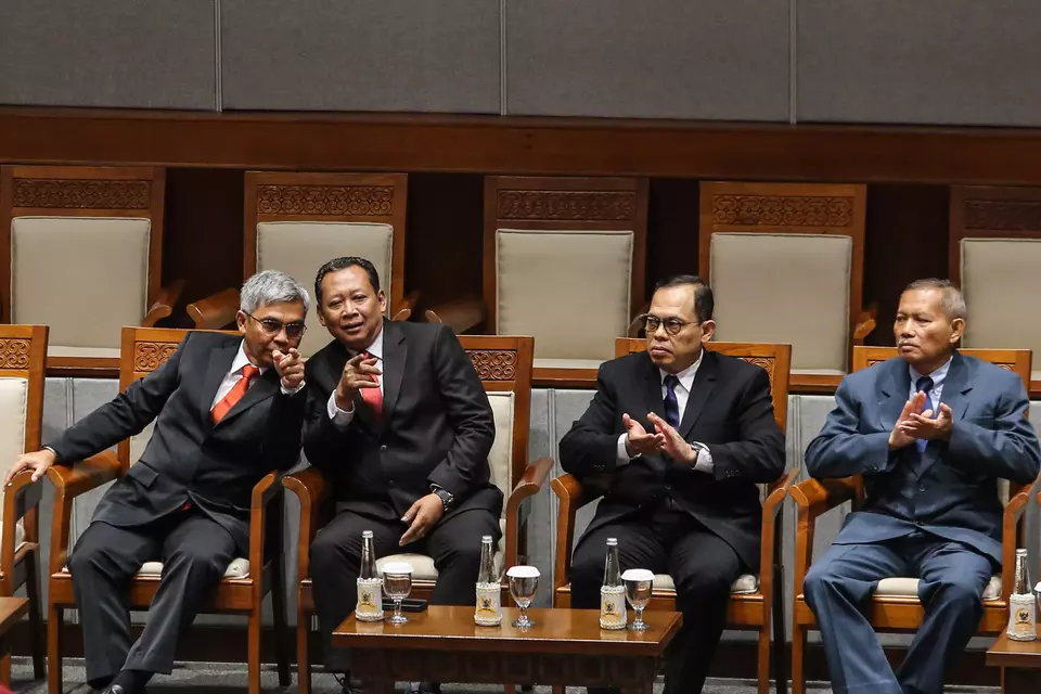 From left: Incoming Corruption Eradication Commission (KPK) Chairman Setyo Budiyanto and newly-appointed KPK Commissioners Fitroh Rohcahyanto, Agus Joko Pramono, and Ibnu Basuki Widodo attend a House of Representatives plenary session at the legislature building in Jakarta, Thursday, Dec. 5, 2024. (Antara Photo/Asprilla Dwi Adha/rwa)