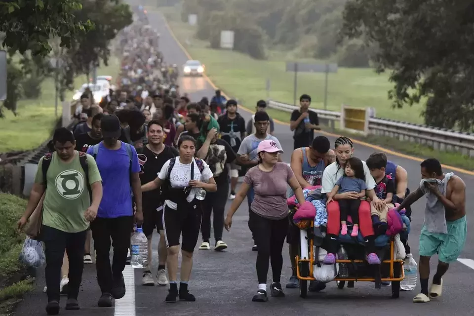 FILE - Migrants walk along the Huixtla highway in the state of Chiapas, Mexico, Oct. 22, 2024, hoping to reach the country