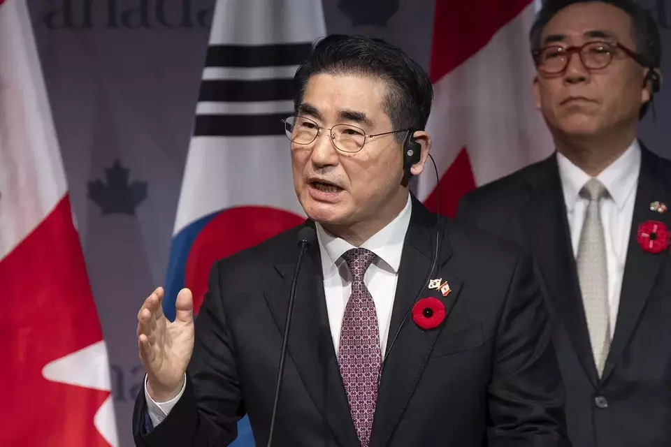 South Korea's Foreign Minister Cho Tae-yul, right, looks on as South Korea's Defense Minister Kim Yong Hyun speaks during a news conference in Ottawa, Ontario, on Nov. 1, 2024. (Adrian Wyld/The Canadian Press via AP)