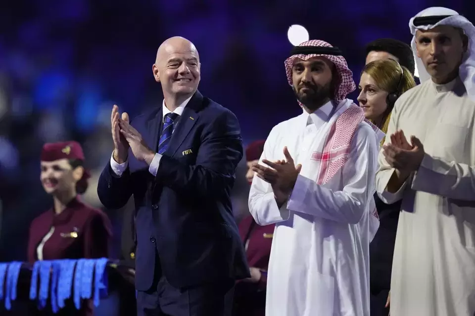 FILE - FIFA President Gianni Infantino, left, applauds during the medals ceremony after the Soccer Club World Cup final match between Manchester City FC and Fluminense FC at King Abdullah Sports City Stadium in Jeddah, Saudi Arabia, Friday, Dec. 22, 2023. (AP Photo/Manu Fernandez, File)