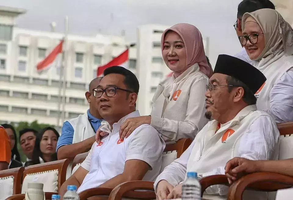 FILE - Gubernatorial candidate Ridwan Kamil, left, and his running mate Suswono attend a campaign rally at Banteng Square in Central Jakarta, Saturday, November 23, 2024. (B-Universe Photo/Joanito De Saojoao)