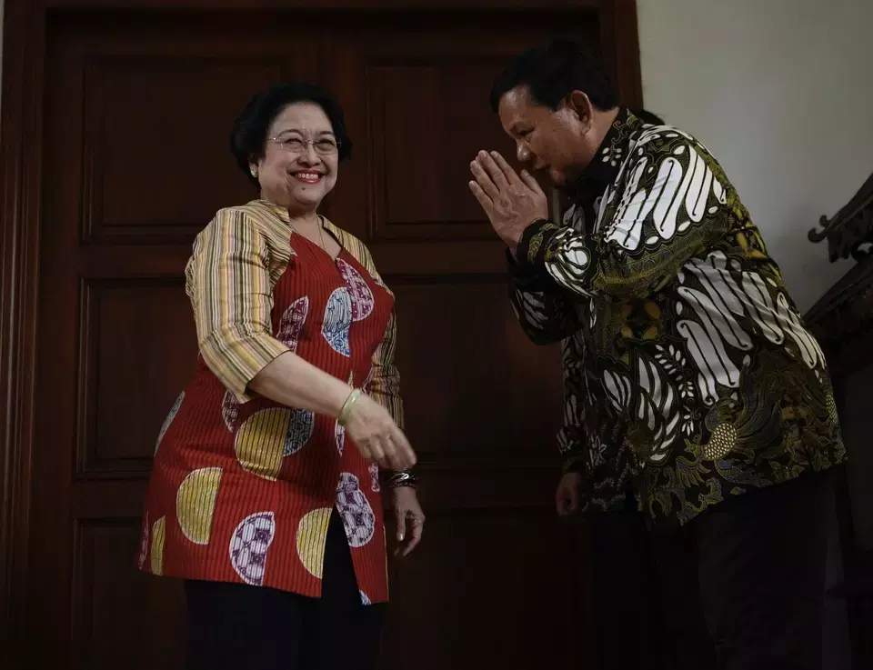 Gerindra Party Chairman Prabowo Subianto (right) bids farewell to PDI-P Chairwoman Megawati Soekarnoputri following a closed-door meeting in Jakarta on July 24, 2019.(Antara Photo/Puspa Perwitasari)