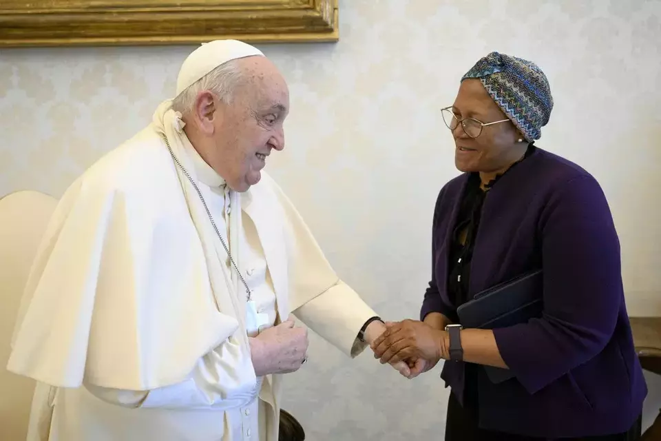 In this picture made available on Thursday, Jan. 16, 2025, by Vatican Media, Pope Francis wears a sling on his right arm, due to a fall earlier in the day, while meeting with FAO Programme Committee Chairperson on World Food Security Nosipho Nausca-Jean Jezile at The Vatican. (Vatican Media via AP, HOGP)