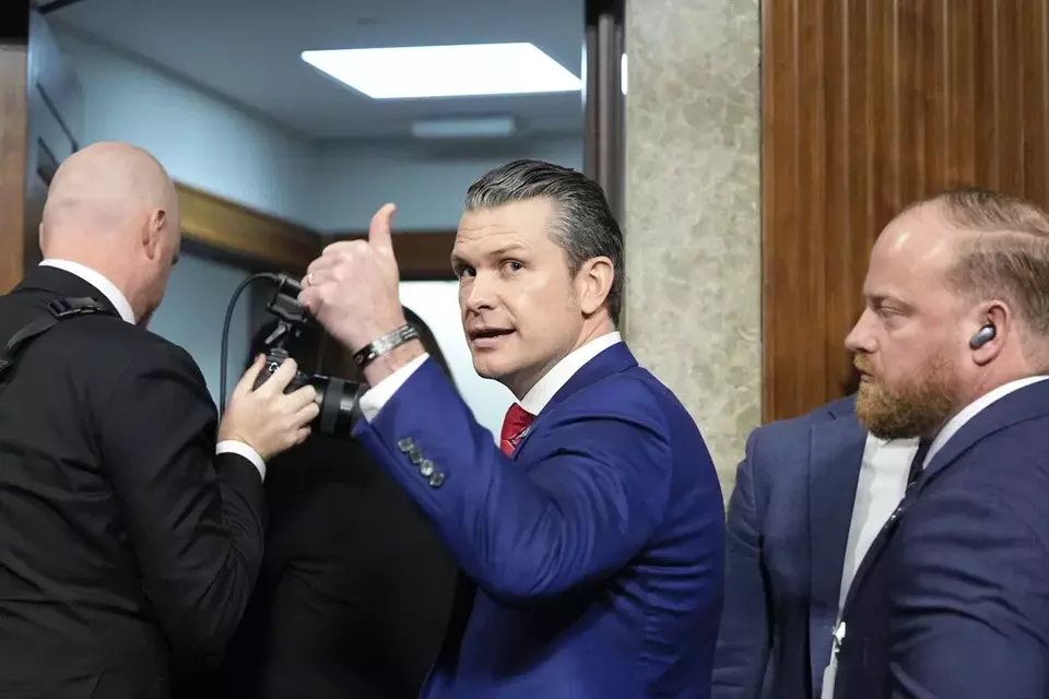 Pete Hegseth gives a thumbs up while leaving after his Senate Armed Services Committee confirmation hearing, at the Capitol in Washington, Tuesday, Jan. 14, 2025. (AP Photo/Alex Brandon)