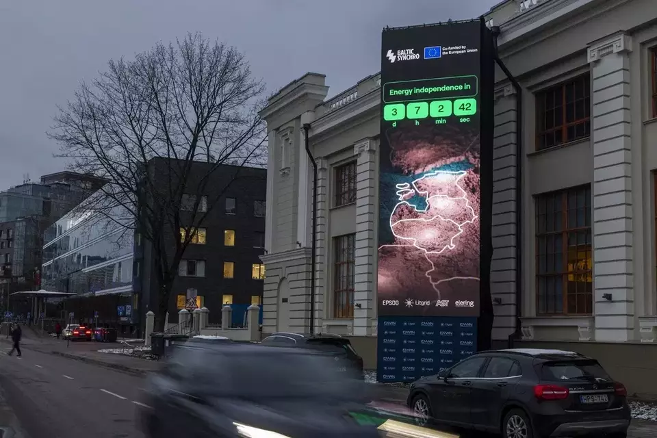 A screen near the Energy Museum and Mindaugas Bridge indicates that on February 8 the Baltic States will disconnect from the Russian electricity grid to synchronize with Continental Europe, in Vilnius, Lithuania, Tuesday, Feb. 4, 2025. (AP Photo/Mindaugas Kulbis)
