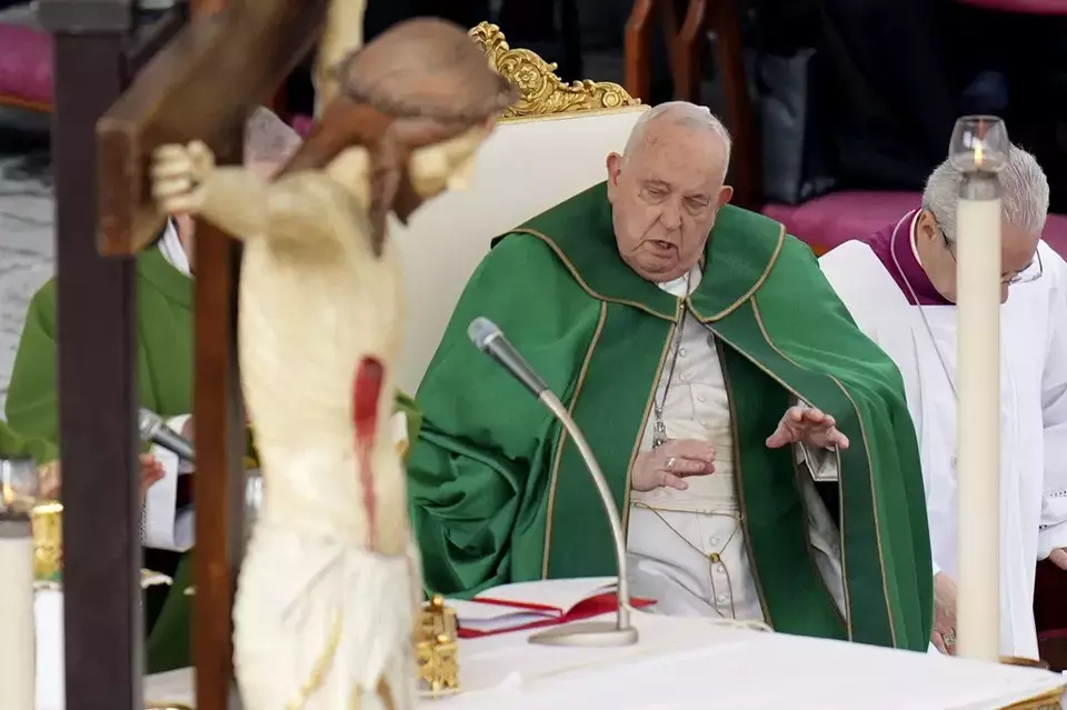 Pope Francis prays as he presides over a mass for the jubilee of the armed forces in St. Peter s Square at The Vatican, Sunday Feb.9, 2025. (AP Photo/Alessandra Tarantino)