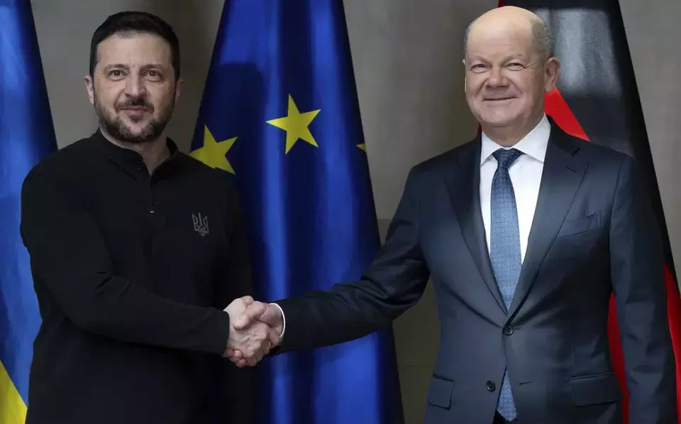 Germany's Chancellor Olaf Scholz, right and Ukraine's President Volodymyr Zelenskyy, meet for talks at the Munich Security Conference, in Munich, Germany, Saturday, Feb.15, 2025. (Sven Hoppe/DPA via AP, Pool)