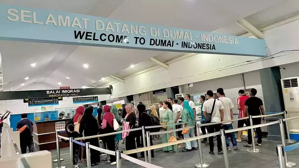 Dozens of Indonesian migrant workers arrive at the Dumai International Port in Riau Province after being deported by Malaysia, Saturday, Feb. 15, 2025. (B-Universe Photo/Effendi Rusli)