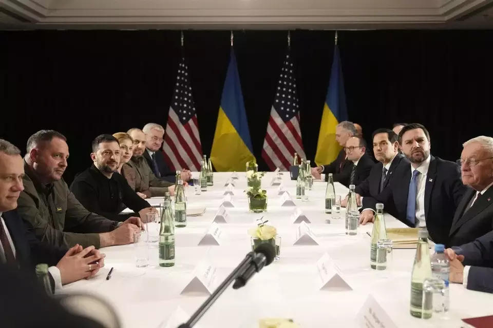 FILE - US Vice-President JD Vance, second right, and US Secretary of State Marco Rubio, third right, meet with Ukraine's President Volodymyr Zelensky, third left, during a bilateral meeting on the sidelines of the Munich Security Conference in Munich, Germany, Friday, Feb. 14, 2025. (AP Photo/Matthias Schrader, File)