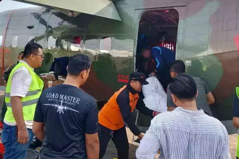 Officers load NaCl into an aircraft for a weather modification operation in Jakarta, Monday, Feb. 17, 2025. (BPBD)