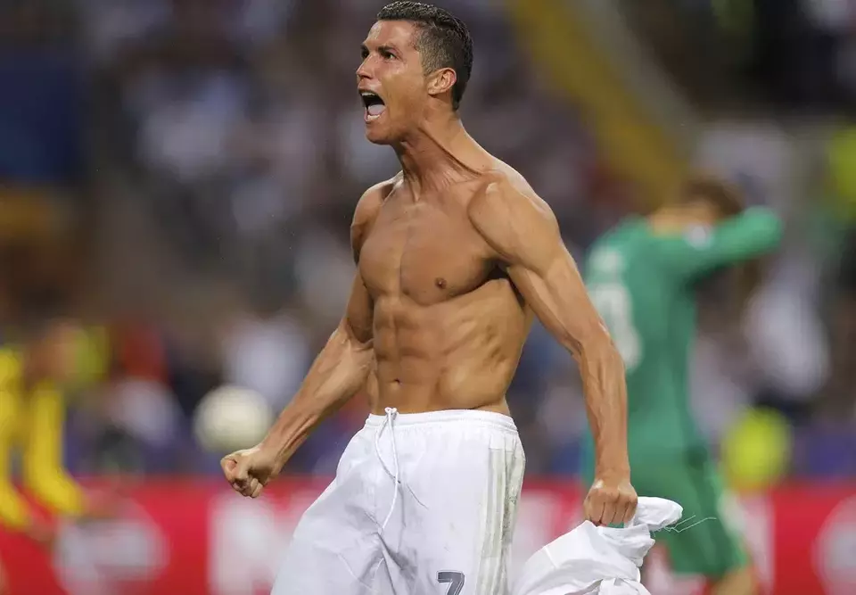 FILE - Real Madrid's Cristiano Ronaldo celebrates after scoring the winning penalty shootout during the Champions League final soccer match between Real Madrid and Atletico Madrid at the San Siro stadium in Milan, Italy, Saturday, May 28, 2016. (AP Photo/Manu Fernandez, File)