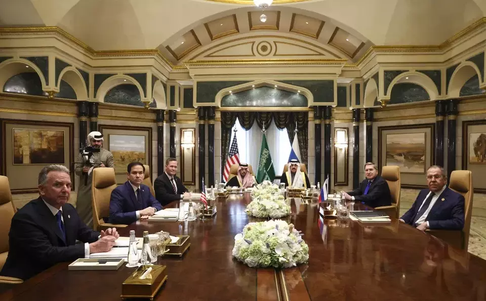 US Secretary of State Marco Rubio, second left, meets with Saudi Foreign Minister Prince Faisal bin Farhan Al Saud, Saudi National Security Advisor Mosaad bin Mohammad Al-Aiban, US National Security Advisor Mike Waltz, third left, US Middle East envoy Steve Witkoff, left, Russian Foreign Minister Sergei Lavrov, right, and Russian President Vladimir Putin's foreign policy advisor Yuri Ushakov, second right, at Diriyah Palace, in Riyadh, Saudi Arabia, Tuesday Feb. 18, 2025. (Evelyn Hockstein/Pool Photo via AP)