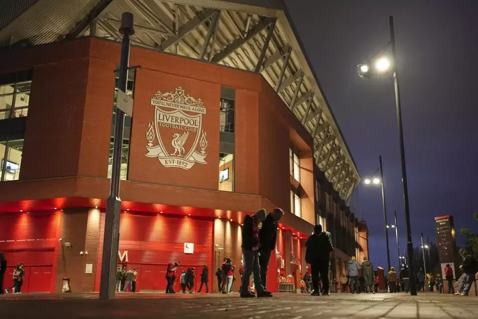 Fans start to arrive for the English Premier League soccer match between Liverpool and Newcastle United at Anfield in Liverpool, Wednesday, Feb. 26, 2025. (AP Photo/Jon Super)