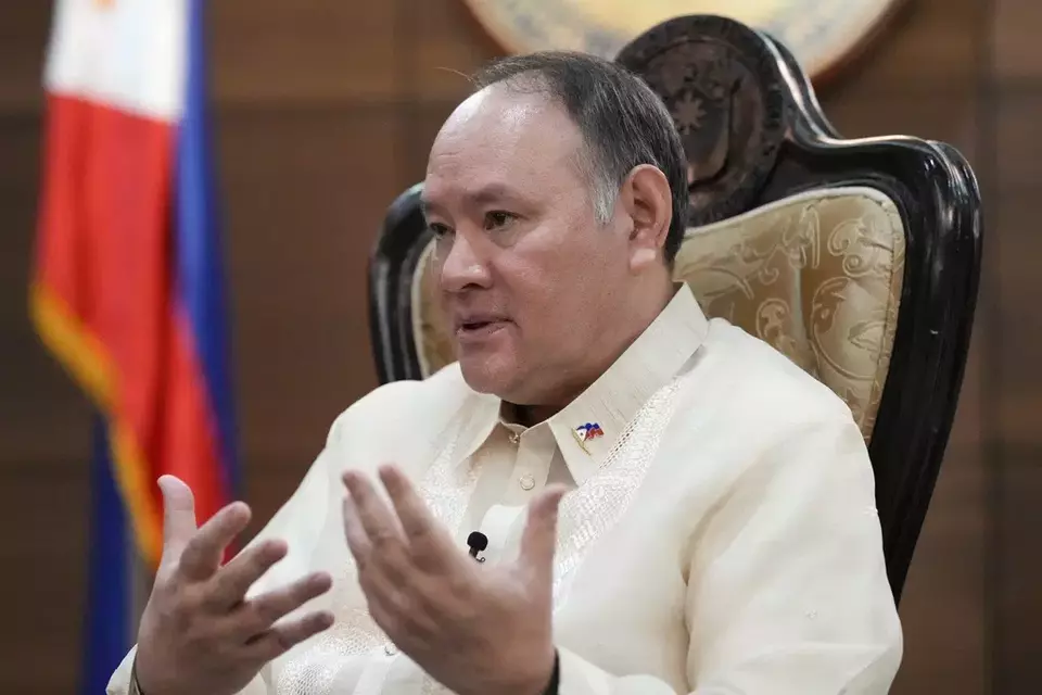 Philippine Defense Secretary Gilberto Teodoro gestures as he answers questions during an interview with the Associated Press at the Department of National Defense headquarters in Quezon city, Philippines on Wednesday, March 5, 2025. (AP Photo/Aaron Favila)