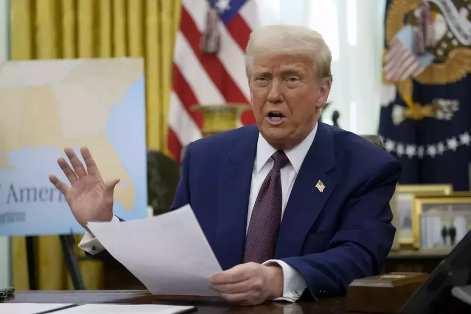 US President Donald Trump speaks to reporters in the Oval Office of the White House in Washington on Feb. 13, 2025. (AP Photo/Ben Curtis) 