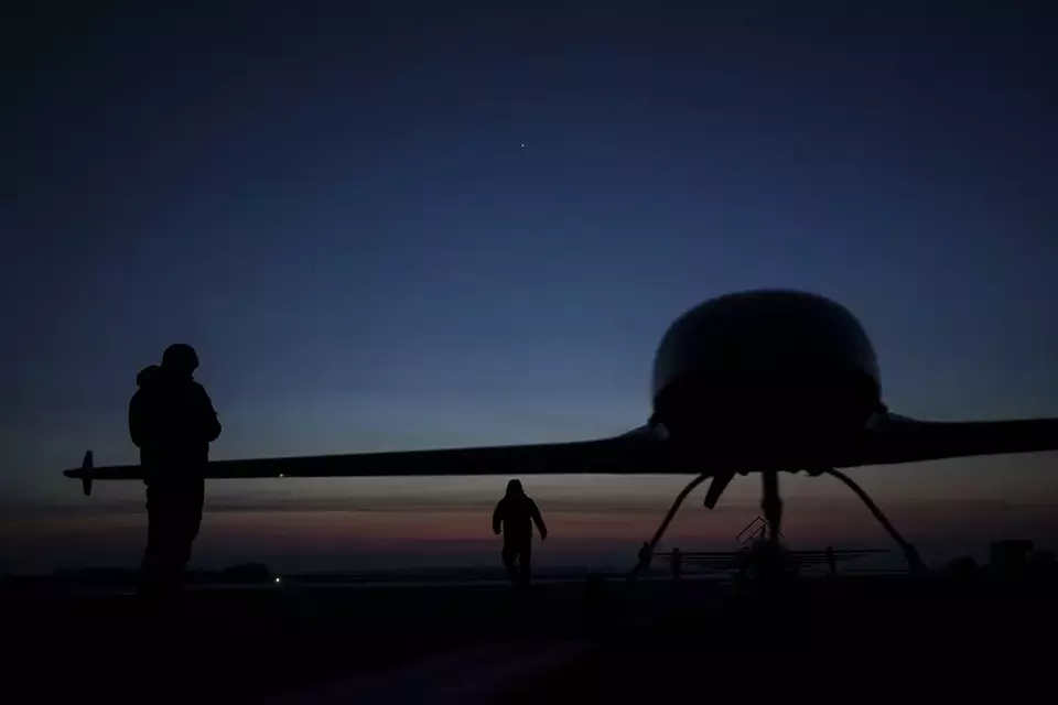 Ukrainian servicemen of the Defence Intelligence prepare to launch long-range drone An-196 Liutyi in an undisclosed location in Ukraine, Feb. 28, 2025. (AP Photo/Evgeniy Maloletka)
