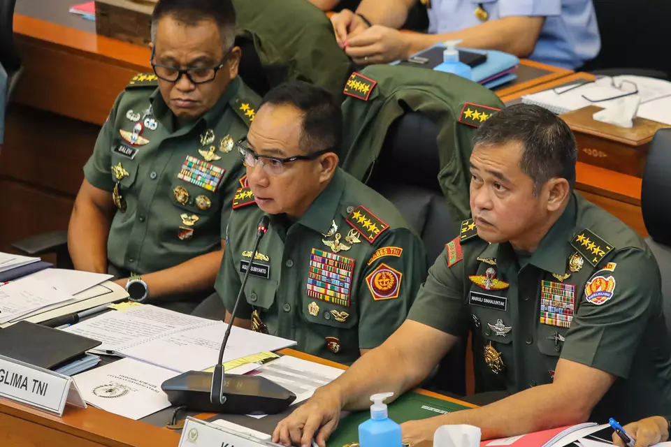 FILE - Armed Forces Commander General Agus Subiyanto, center, Army Chief of Staff General Maruli Simanjuntak, right, and Inspector General Muhammad Saleh Mustafa attend a hearing with the House of Representatives' Defense Commission at the national legislature building in Jakarta, Thursday, March 13, 2025. (Antara Photo/Asprilla Dwi Adha)