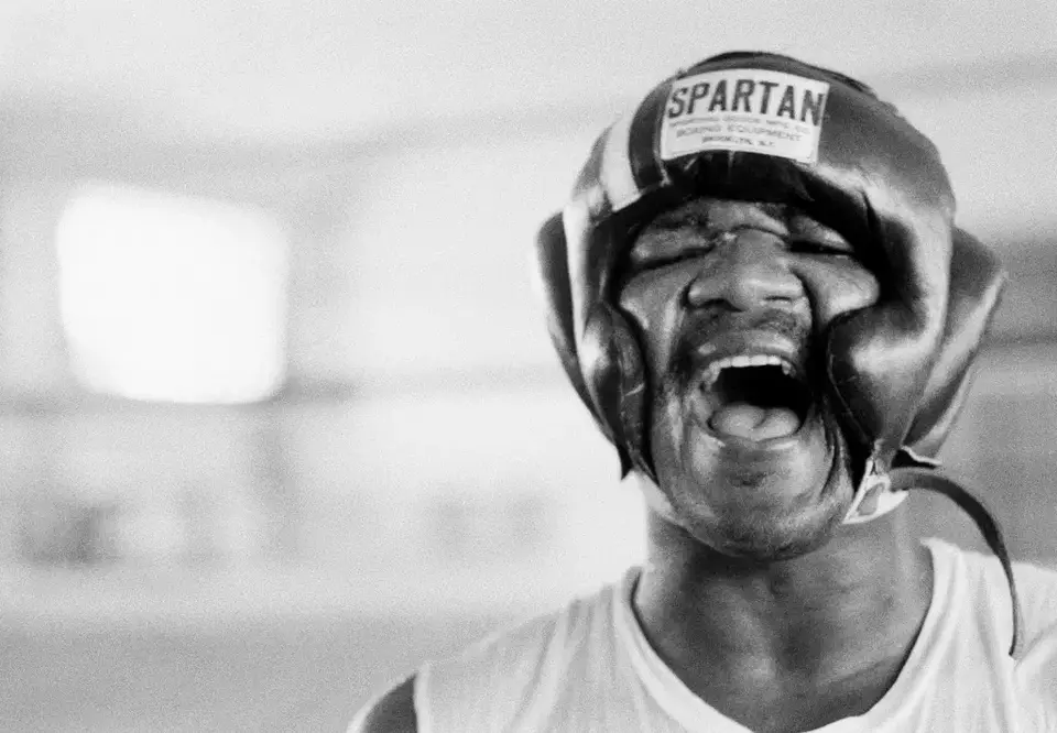 George Foreman yells, Oct. 15, 1974, in N'Sele, Kinshasa, Zaire. (AP Photo/Horst Faas)