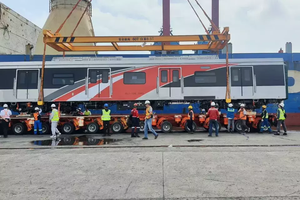 Workers unload a railway carriage from a cargo ship at Tanjung Priok Port in North Jakarta, Friday, Jan. 31, 2025. (Photo courtesy of KAI Commuter)